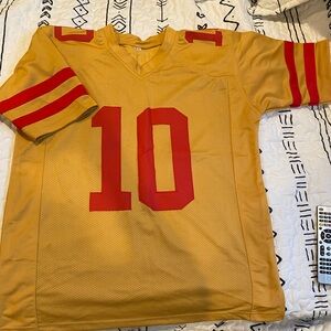 New Garoppolo Jersey, Size Small, mustard and red color.